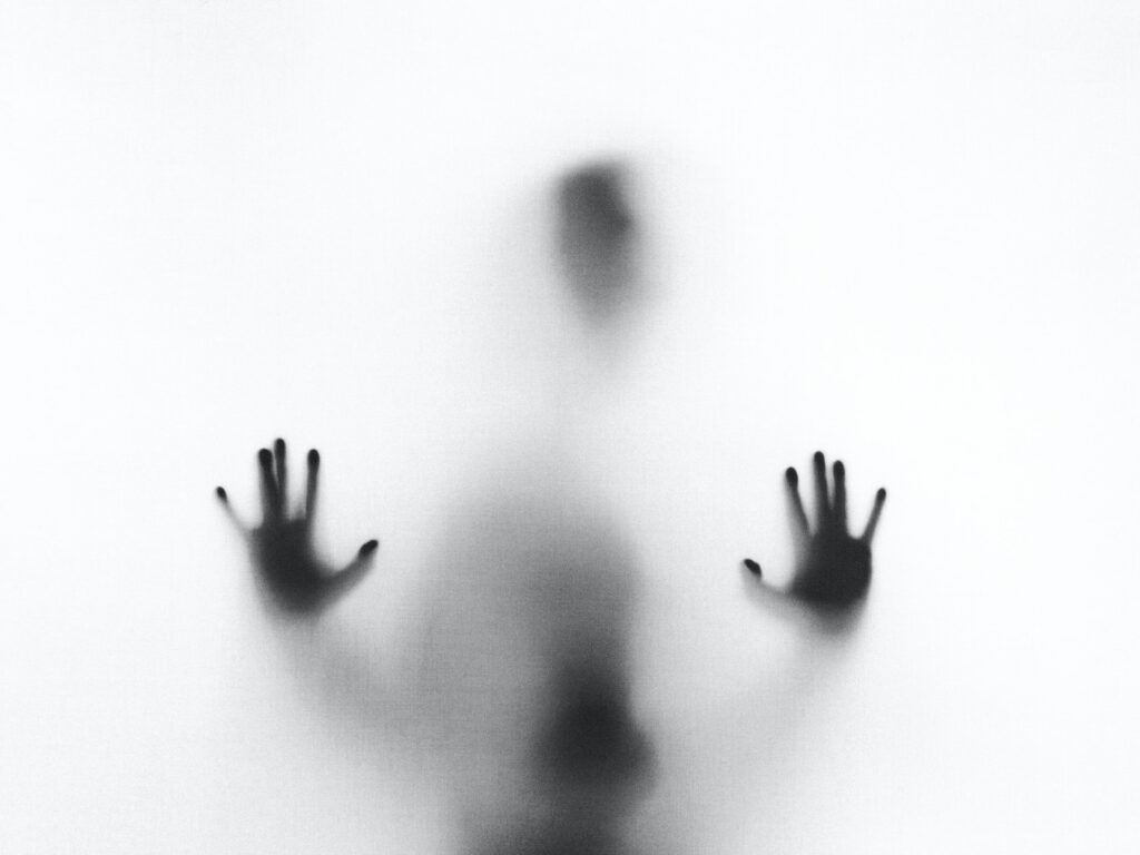 A shadowy figure against a translucent background spooky webcam backgrounds