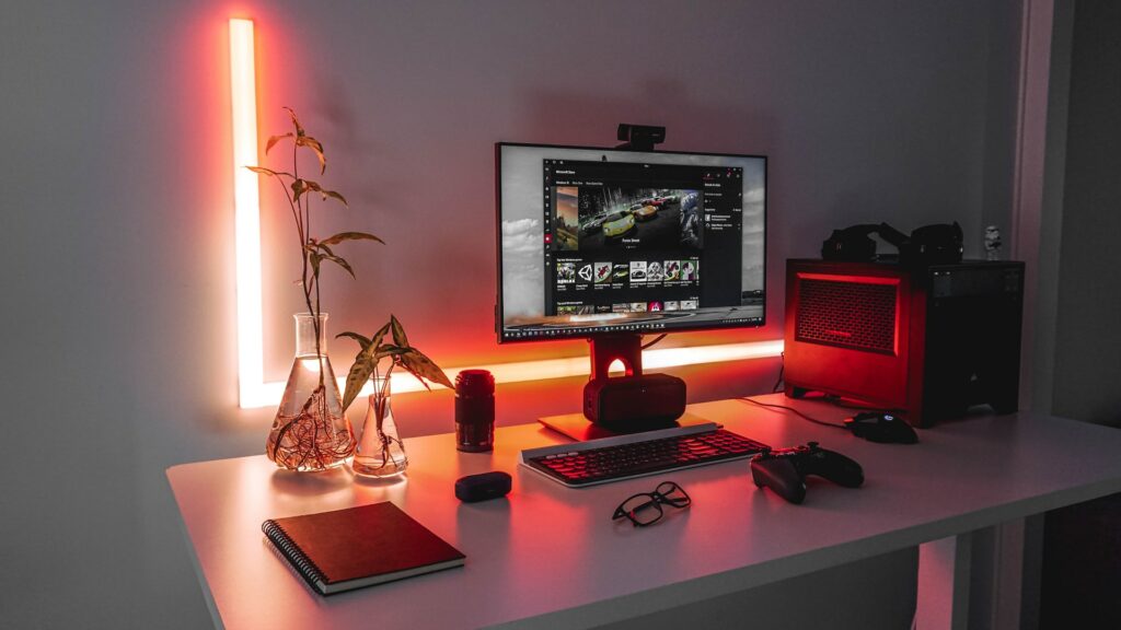 A small streaming spaces with a single monitor on a desk.