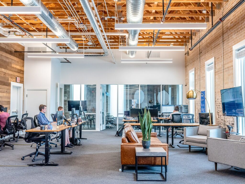 A large open plan office with a sofa in the centre as a free webcam background