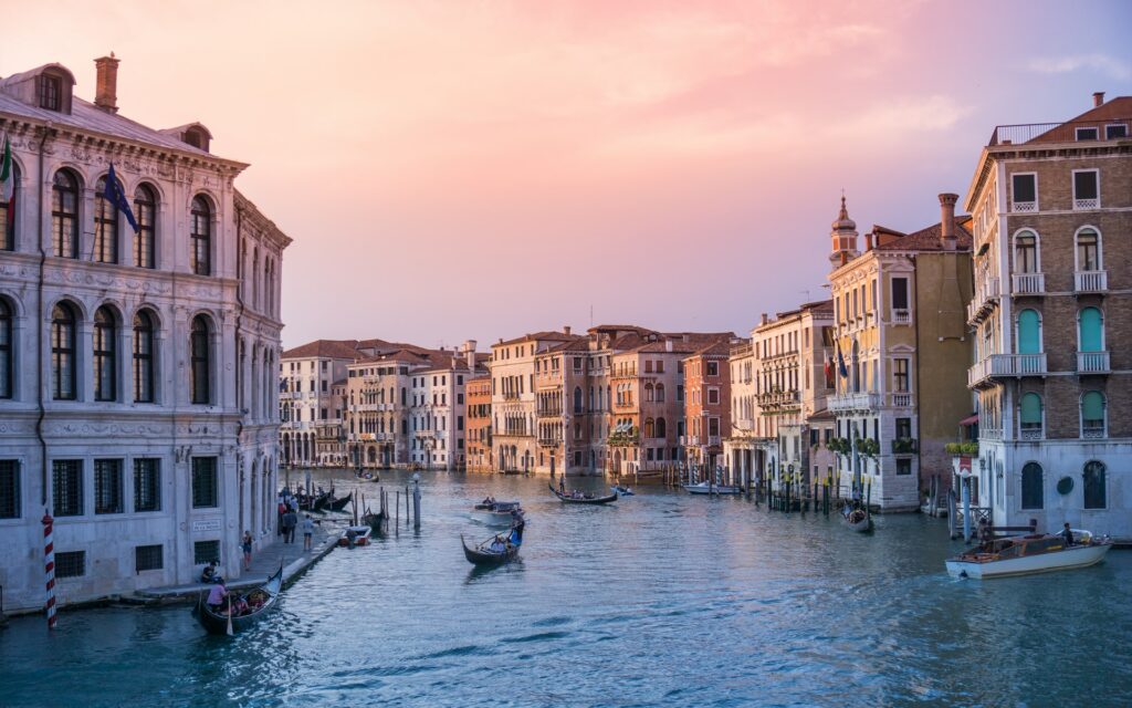 An image of italy with people on gondelas