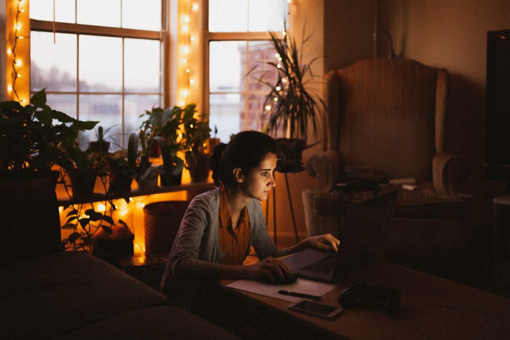 A person giving a remote pitch from their coffee table.