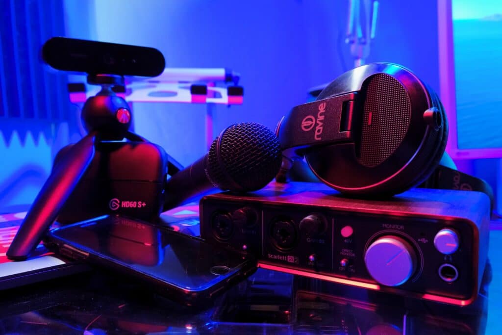 Things you shouldn't do when you start streaming would include buying all the gear you can see in this picture, a sound card, a microphone, a capture card, a webcam, a stand, headphones and a phone.